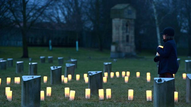 Commemorations to mark the 70 year anniversary of the liberation of Auschwitz have taken place all over Europe. Here,a  child reflects at a Jewish ceremony not far from the camp. AFP  Michal Cizek