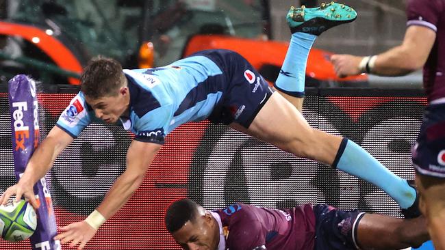 A high-flying Alex Newsome in action for the Waratahs last season.