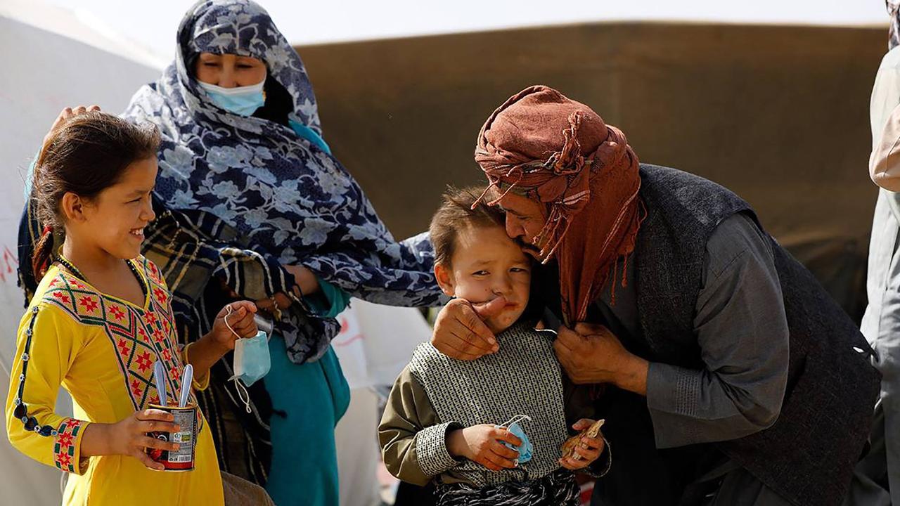 Afghan refugees gathered at the Iran-Afghanistan border. Picture: Mohammad Javadzadeh / IRANIAN RED CRESCENT / AFP.