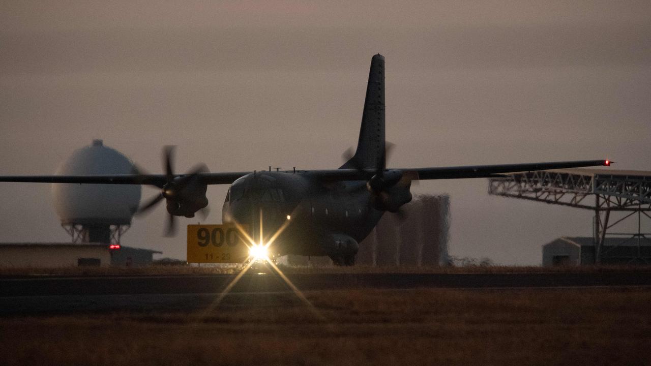 The bodies of three US Marines, Corporal Spencer Collart, 21, Captain Eleanor LeBeau, 29 and Major Tobin Lewis, 37, arrive back in Darwin following a fatal Osprey crash near Pickataramoor on the Tiwi Islands. Picture: Pema Tamang Pakhrin