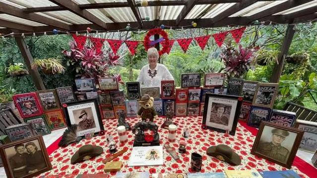 Pam Mitchell with her collection of Anzac Day tins in Valla. Source: Supplied