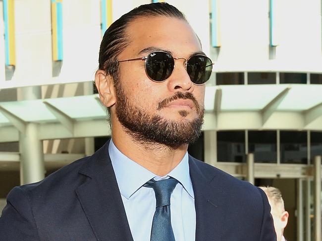 Rugby union player Karmichael Hunt leaves the Magistrates Court in Brisbane on Monday, February 19, 2018. Mr Hunt has had a drugs charge dropped due to a lack of evidence but has been fined $600.  (AAP Image/Jono Searle) NO ARCHIVING