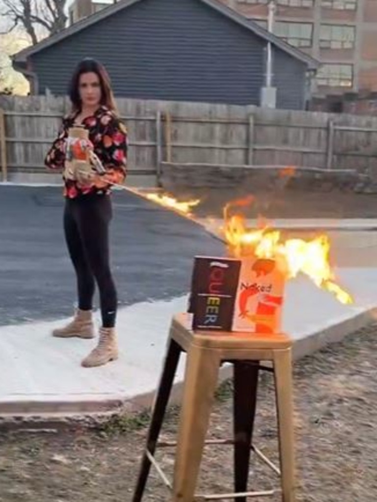 Ms Gomez used a flamethrower to torch the books in a video shared online. Picture: X@ValentinaForSOS