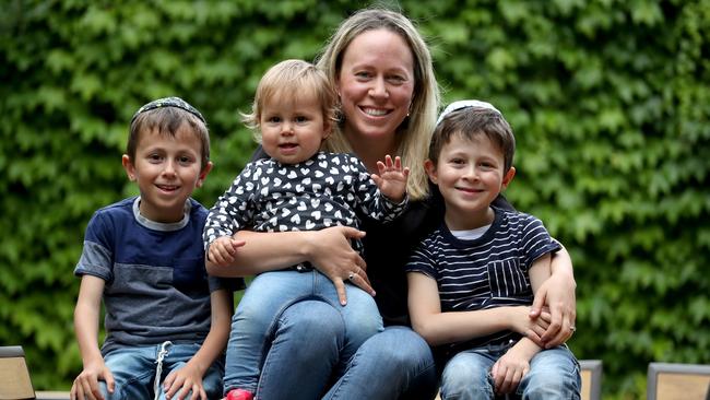 Zoe Goodhardt with her children, Ezra, 6, Jasmine, 1, and Rami, 4, at their home in Caulfield, Melbourne. Picture: David Geraghty