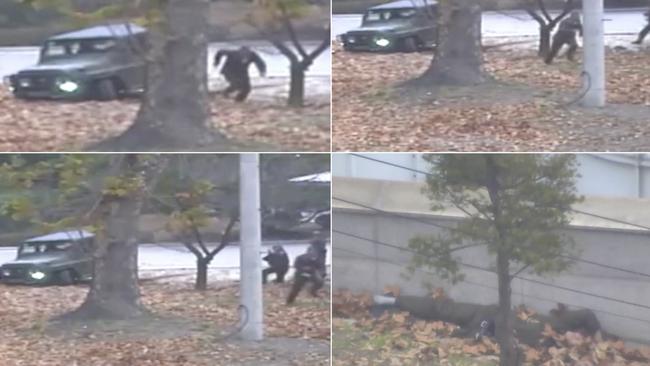 A North Korean soldier running from a jeep and then shot by North Korean soldiers in Panmunjom, North Korea, before collapsing across the border in South Korea. Picture: United Nations Command