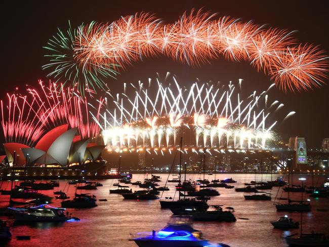 The midnight fireworks are seen from Mrs Macquarie's Chair during New Year's Eve celebrations in Sydney. Picture: AAP