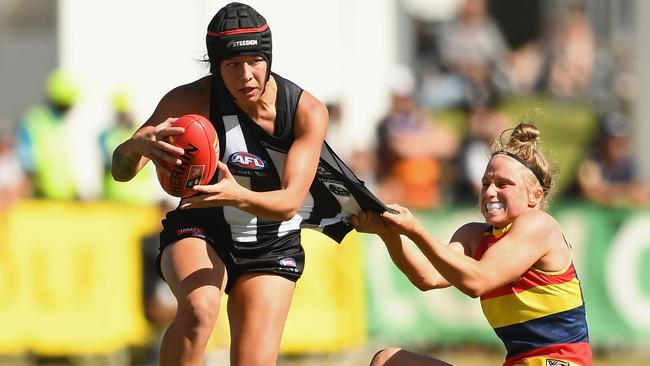 Brittany Bonnici gets a kick away after being tackled on Sunday. Picture: Getty Images