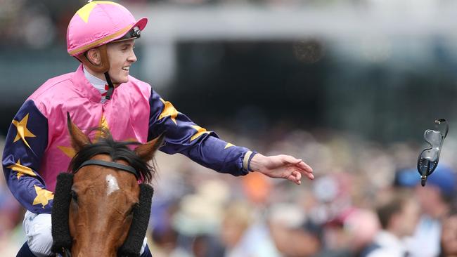 If your fortunate to get a place alongside “victory parade’ where the horses return to the saddling enclosure, sometimes a winning jockey will part with his googles. Picture: Wayne Ludbey