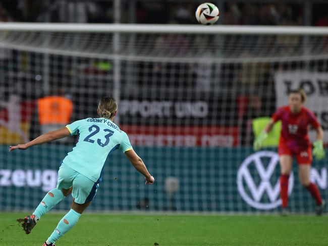 Kyra Cooney-Cross chips Germany’s keeper from near the halfway line. Picture: Alex Grimm/Getty Images