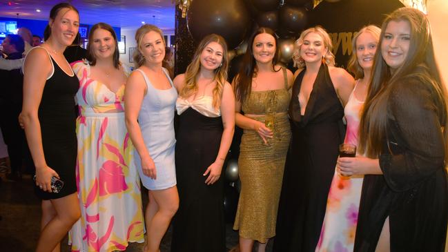 Sally Trew, Nikki Dalrymple, Hayley Cameron, Alana Morley, Tara Whelan and friends having a great night at the Cowwarr Saints Football &amp; Netball Club Golden Gala Ball 2024. Picture: Jack Colantuono