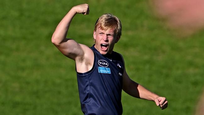 Charles Dowling celebrates after scoring a goal for OM’s against St Kevins at Elsternwick Park on Saturday. Picture: Andy Brownbill