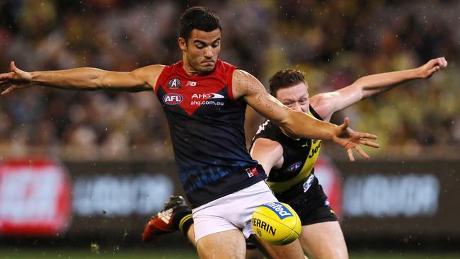 Melbourne's Billy Stretch drives the Demons into attack. Picture: Michael Klein