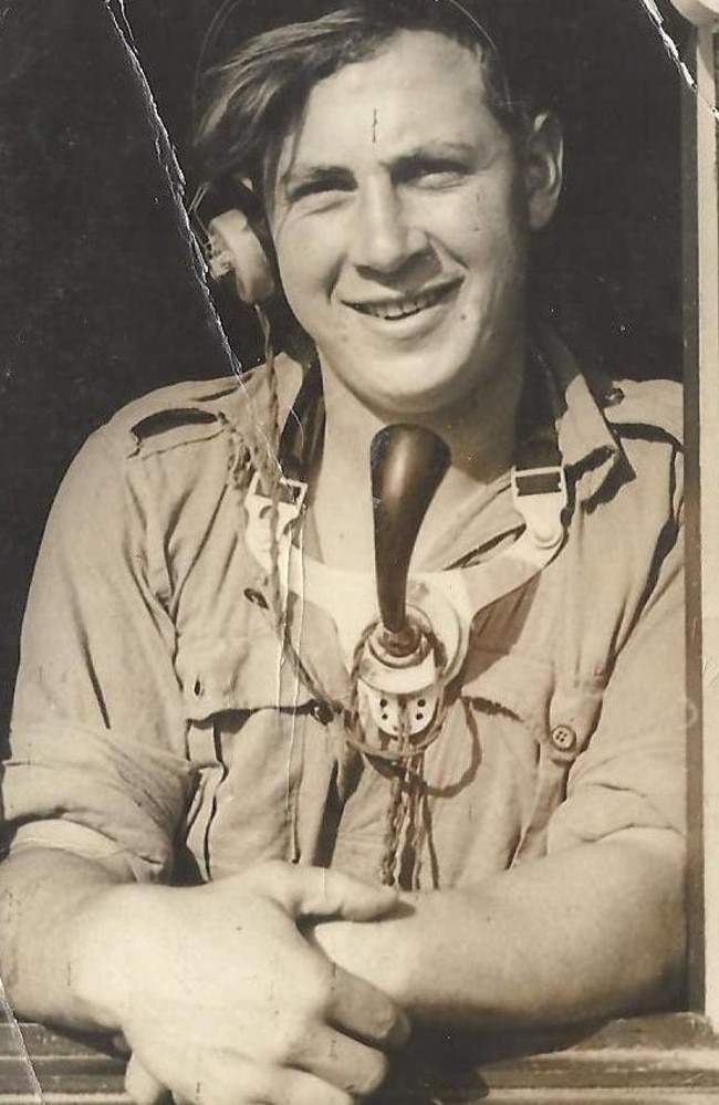 In search of adventure ... as a new recruit, Archie Fingher poses with a radio.