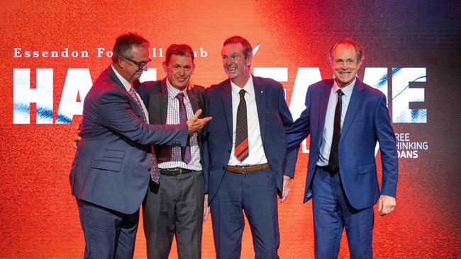 Neale Daniher is pictured with brothers Terry, Anthony and Chris after being elevated to legend status at the 2022 Essendon Football Club Hall of Fame dinner.