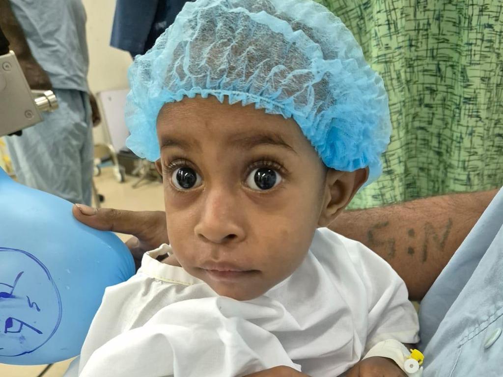 Dr Coughlan has operated on almost 100 men, women and children — including this little cutie — in Papua New Guinea since 2019. Picture: Supplied