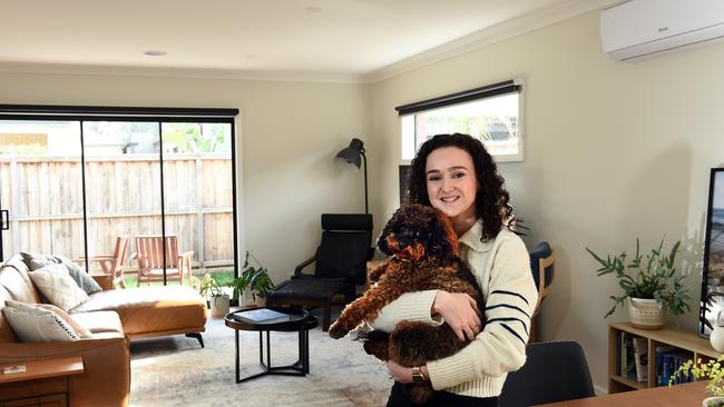 Occupational therapist Beth Crosby secured a $20,000 discount on a block of land in a Villawood Properties estate that helped get her and partner Ethan, as well as their dog Nova, on the path to building a new home.