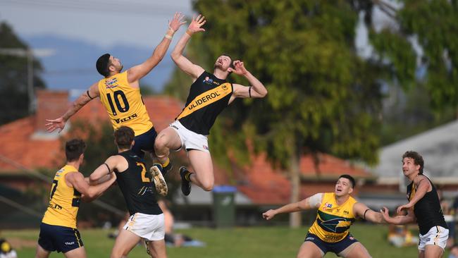 Nick Minchin (right) goes up in the ruck for Glenelg last season. He’s joined Frankston in the VFL. Picture: Tricia Watkinson