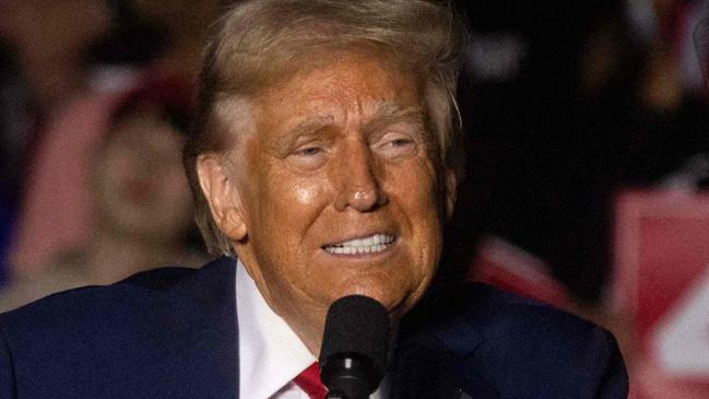 TOPSHOT - Former US President and Republican presidential candidate Donald Trump speaks during a campaign rally at the McCamish Pavilion in Atlanta, Georgia, October 28, 2024. (Photo by CHRISTIAN MONTERROSA / AFP)