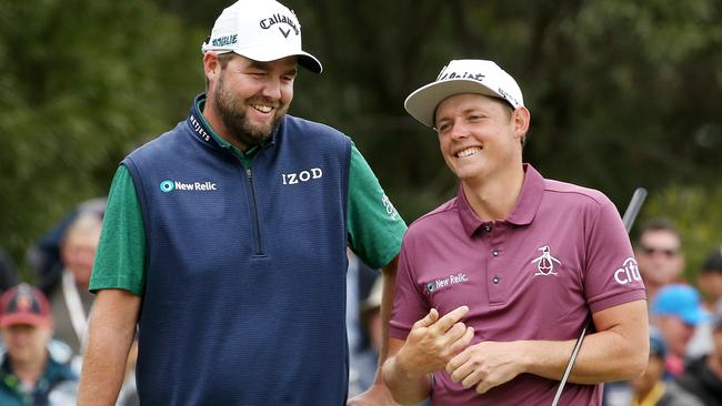 Marc Leishman and Cameron Smith have a laugh early in the final round. Picture: Michael Klein