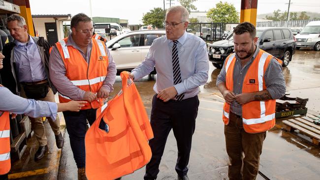 Mr Morrison was given a fluoro vest to wear inside the factory. Picture: Jason Edwards