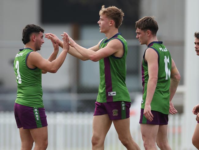 Liam Farrar of Parade College celebrates kicking a goal during the Herald Sun Shield Senior Boys Div 1 Grand Final.