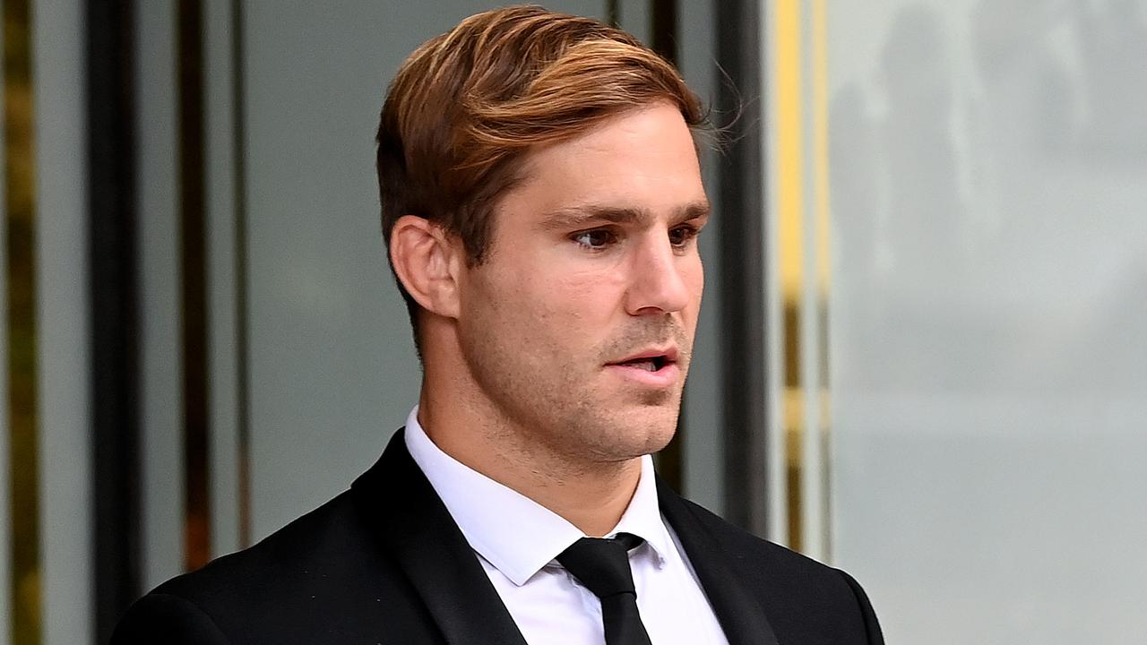 Rugby league player Jack de Belin (right) is seen during a break at the Downing Centre Courts in Sydney.