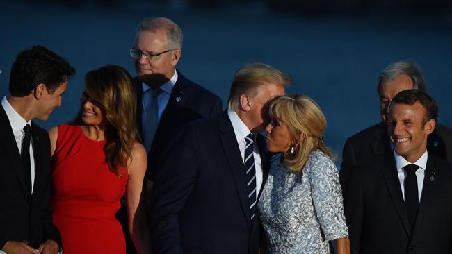 Prime Minister Scott Morrison … note in the background … as Justin and Melania chat away on one end and Donald Trump whispers into the ear of France's First Lady Brigitte Macron while her husband France's President Emmanuel Macro is sidelined. Picture: AAP