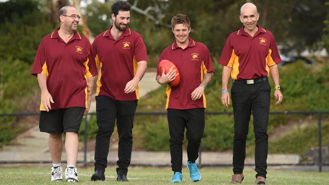 Nunawading president Wayne Devene, co-captains Luke Bogdan, Marty Lambe and coach Paul Beven. Picture: Chris Eastman