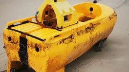 A mystery yellow object has washed up at Double Island Point on the Teewah Beach side. Picture: Geoff Feeley