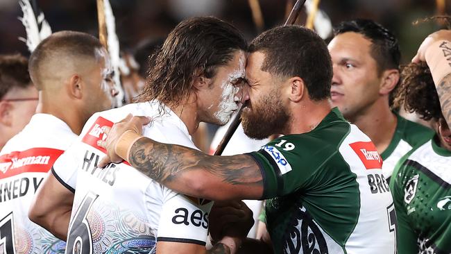 SYDNEY, AUSTRALIA - FEBRUARY 12: Nicho Hynes of the Indigenous All Stars and Kenny Bromwich of the Maori All Stars exchange greeting before play during the match between the Men's Indigenous All Stars and the Men's Maori All Stars at CommBank Stadium on February 12, 2022 in Sydney, Australia. (Photo by Mark Kolbe/Getty Images)