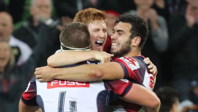 MELBOURNE, AUSTRALIA - APRIL 15:  Nic Stirzaker and Jack Debreczeni of the Rebels celebrate at the full time whistle as they win the round eight Super Rugby match between the Rebels and the Brumbies at AAMI Park on April 15, 2017 in Melbourne, Australia.  (Photo by Scott Barbour/Getty Images)