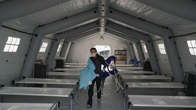 Beds are lined up in a tent as volunteers from the International Christian relief organisation Samaritan’s Purse set up an emergency Field Hospital for coronavirus patients in Central Park across from Mt. Sinai Hospital in New York City. Picture: Bryan R Smith/AFP