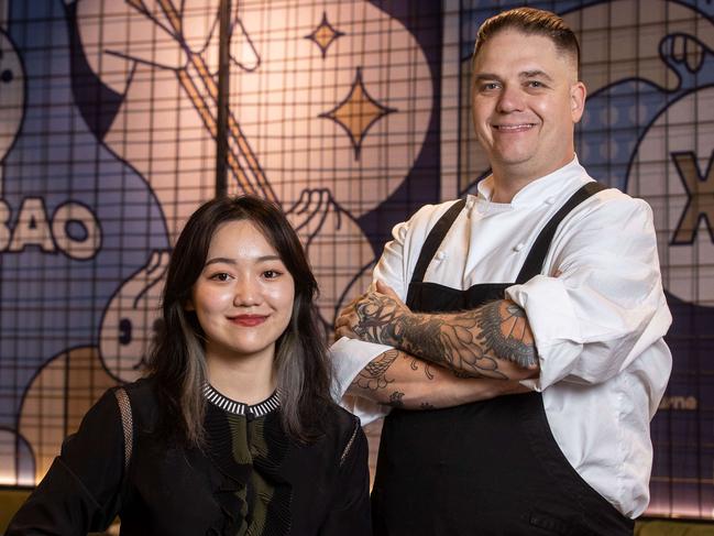 Xi Restaurant is the first restaurant by 25-year-old entrepreneur by Lu Gan, pictured with chef Fudge. Picture: Jake Nowakowski