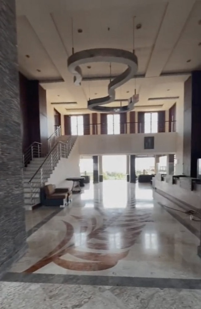 The hotel’s reception is still in good condition but is overrun with insects. Picture: Padesignstudio/Jam Press