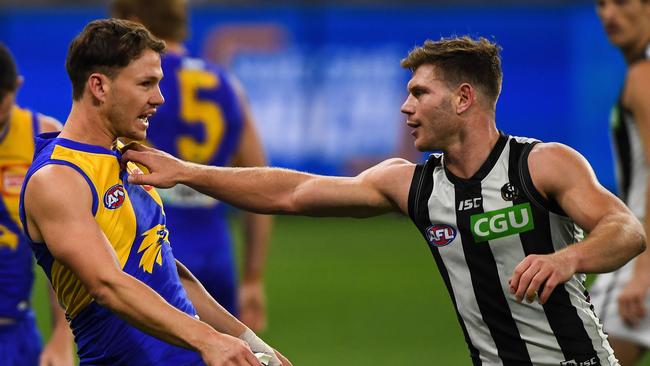 Taylor Adams pushes away Eagles opponent Jack Redden. Picture: Getty Images