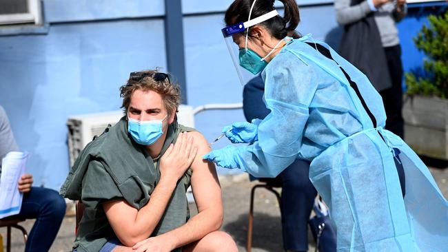 Local residents in Marrackville, in the inner city suburb of Sydney attend a pop-up Covid-19 vaccination hub. Picture: NCA NewsWire / Jeremy Piper