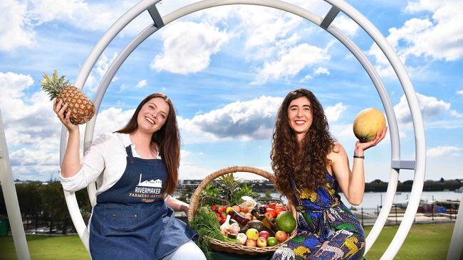 Maddy Ross market manager and Georgia Rowe vendor with their fresh produce at Rivermakers Farmers and Artisan Markets. Picture: Patrick Woods