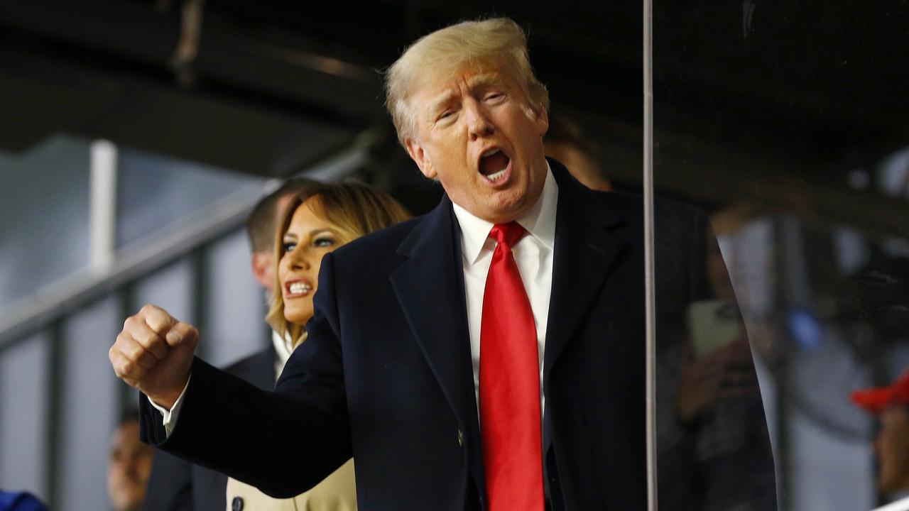 ATLANTA, GEORGIA - OCTOBER 30: Former president of the United States Donald Trump waves prior to Game Four of the World Series between the Houston Astros and the Atlanta Braves Truist Park on October 30, 2021 in Atlanta, Georgia. (Photo by Michael Zarrilli/Getty Images)