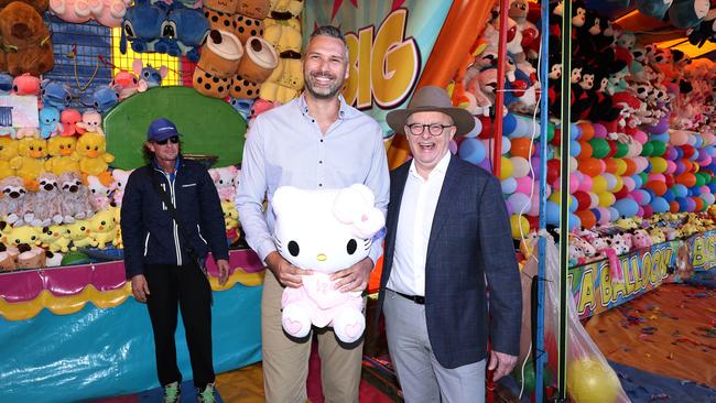 Labor Party candidate for Leichhardt Matt Smith and Australian Prime Minister Anthony Albanese with their Hello Kitty plush toy won on the basketball skills game at the final day of the 2024 Cairns Show. Picture: Brendan Radke