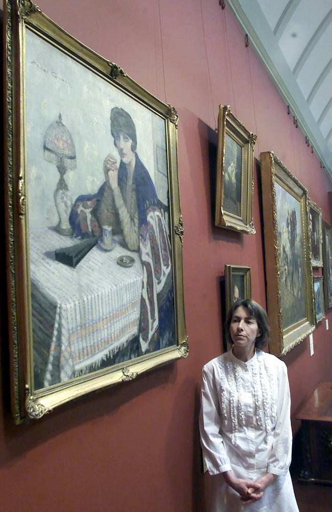 Quinlan at the Bendigo Art Gallery with its favourite piece 'Girl with Cigarettes' by Agnes Goodsir.