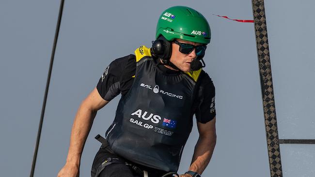 Chris Draper, wing trimmer of Australia SailGP Team, runs across the F50 during a practice session ahead of the Emirates Dubai Sail Grand Prix presented by P&O Marinas in Dubai, UAE. Thursday 21 November 2024. Photo: Felix Diemer for SailGP. Handout image supplied by SailGP