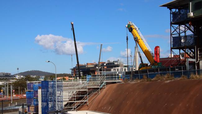 A worker on the Cross River Rail project was critically injured after plunging up to 12m from the Boggo Rd station site. Picture: David Clark