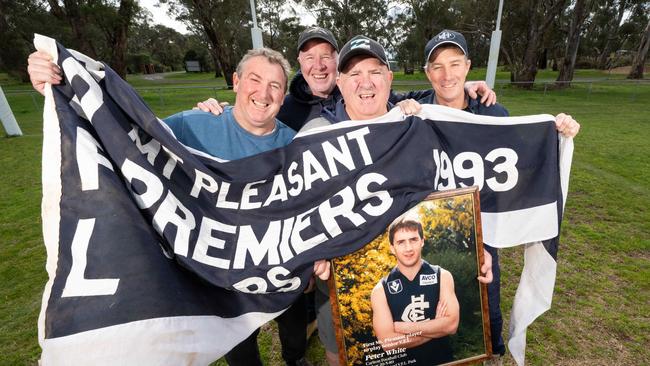 Mick White, Chris Nihill, Wes White and David McNamara with picture of Peter White ahead of this weekend’s reunion. Picture: Rob Leeson.