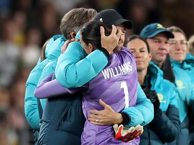 Tony Gustavsson, pictured embracing Lydia Williams, will be able to use alternates as squad members after a rule change. Picture: Cameron Spencer/Getty Images