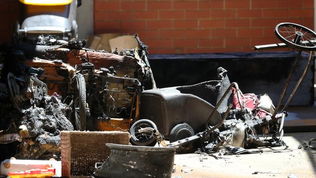 Debris in the burnt-out garage. Picture: David Crosling