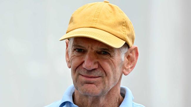 Red Bull Racing's technical chief Adrian Newey arrives in the pits of the Circuit de Monaco before the second practice session of the Formula One Monaco Grand Prix on May 24, 2024, two days ahead of the race. (Photo by ANDREJ ISAKOVIC / AFP)