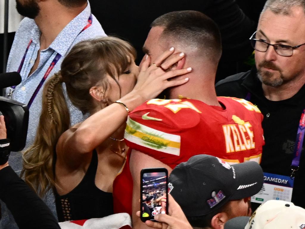 Taylor Swift kisses Travis Kelce after the Chiefs won Super Bowl LVIII against the San Francisco 49ers at Allegiant Stadium in Las Vegas, Nevada, February 11, 2024. Picture: Patrick T. Fallon / AFP