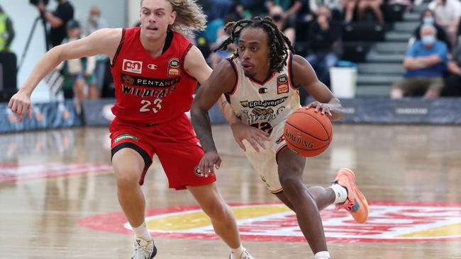 Tahjere McCall of the Cairns Taipans and Luke Travers of the Perth Wildcats during the NBL Blitz match between Perth Wildcats. (Photo by Sarah Reed/Getty Images)