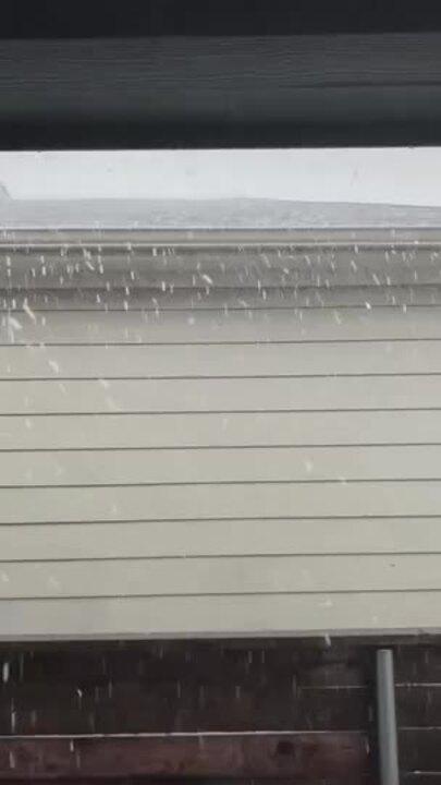 Hail Blankets Austin Backyard During Severe Storm