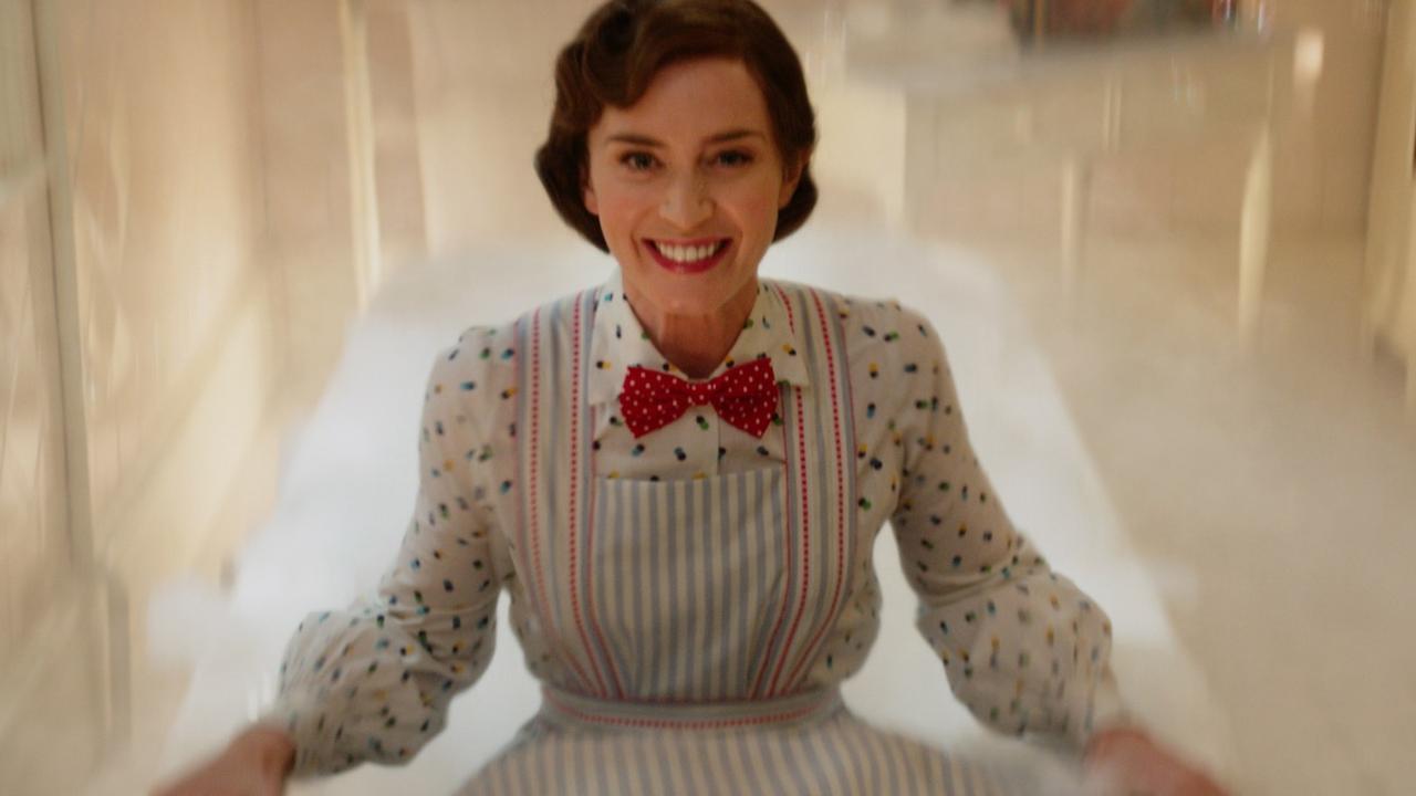 Emily Blunt as Mary Poppins, just before she falls backwards into a bathtub — and disappears completely. 